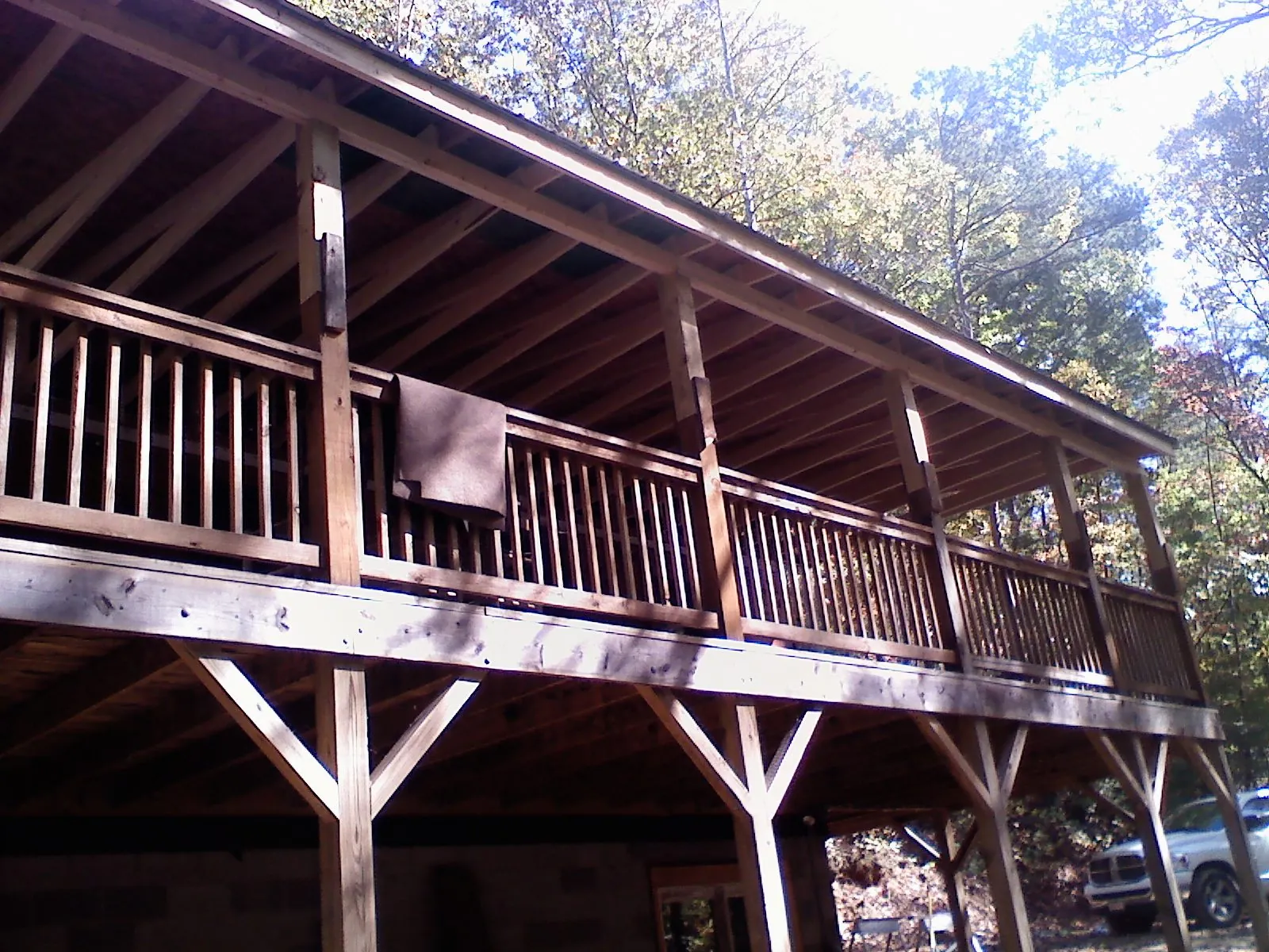 Timber framing under a new elevated porch and deck — Roof Leak Repair in Lahoma by Roofing Brothers